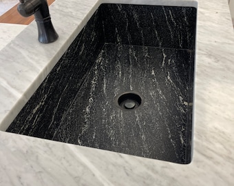 Custom handmade zero radius granite sink. Solid natural stone is as tough as it is beautiful. Hand made in the USA and shipped to your door!