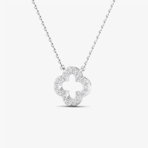 May include: A silver necklace with a four-leaf clover pendant encrusted with clear cubic zirconia stones.
