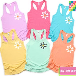 a women's tank top with the words women's ideal racerback tank