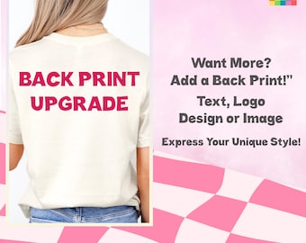 May include: Cream-colored t-shirt with the words "BACK PRINT UPGRADE" in bold, red letters. Additional text on the right side promotes adding a back print with text, logo, design, or image to express your unique style. The background is pink.