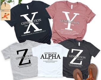May include: A collection of t-shirts in various colors, each featuring a large letter and the word "GENERATION" along with a birth year range. The shirts are for Generation X, Y, Z, and Alpha.
