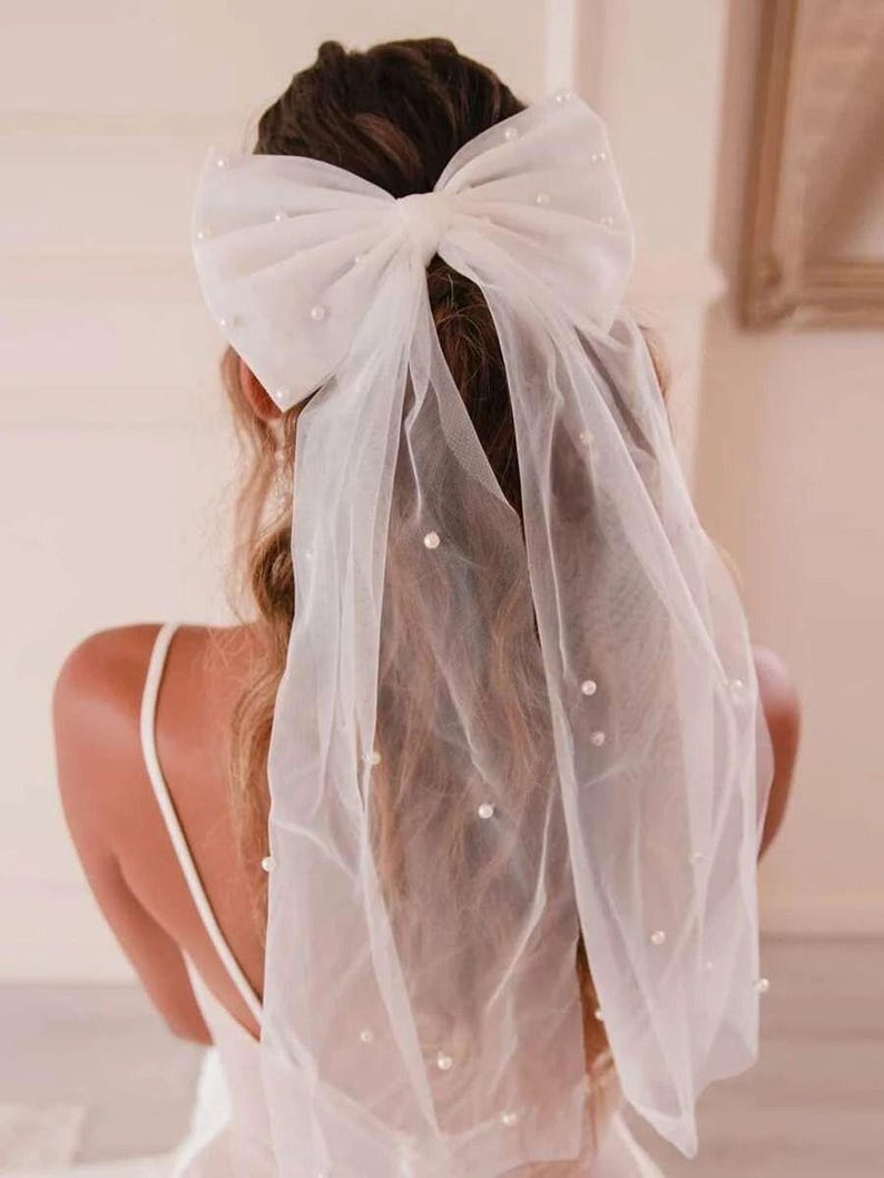 Elegant Hair Bow White Tulle Design Pearl Accent Collection Wedding Hair Piece Premium Quality Construction Bridal Style Accessory Flowing Ribbon Detail Princess Look Essential Special Occasion Perfect Formal Event Beautiful Wedding