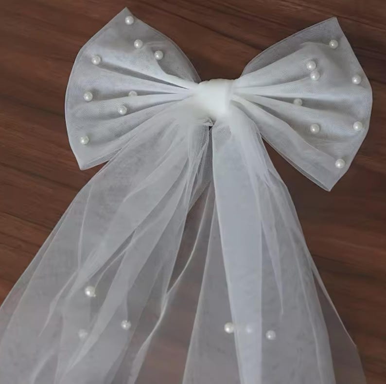 Princess Style Hair Piece White Tulle Bow Collection Pearl Accent Detail Wedding Hair Accessory Premium Construction Elegant Flowing Design Beautiful Bridal Essential Perfect Special Occasion Formal Event Romantic Wedding Collection