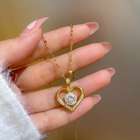 Love symbol locket in gold hotsell