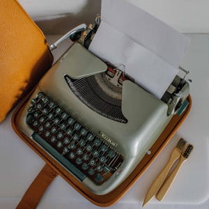 1961 Erika model 12, working typewriter with case, gift writer, 1960s