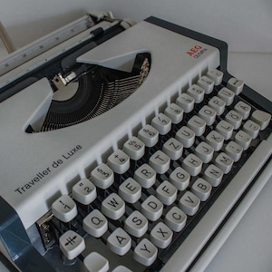 OLYMPIA Traveller de Luxe, working typewriter, vintage typewriter with case, gift for her, 1970s