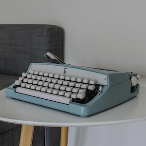 Brother De Luxe portable working typewriter with case, blue vintage typewriter, office decor, 1960s