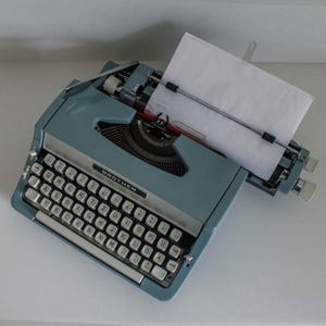 Working Typewriter Brother, Vintage Typewriter made in German with case, 1960s
