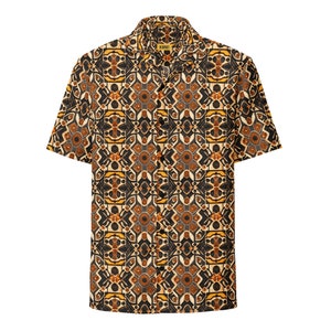 May include: A short-sleeved button-down shirt with a geometric pattern in shades of brown, yellow, and white.