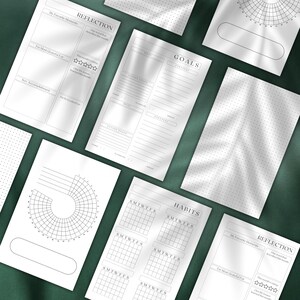 May include: A set of printable planner pages with sections for reflection, goals, habits, and a weekly tracker. The pages are designed with a minimalist aesthetic and feature a dotted background.