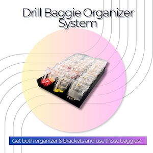 May include: A black plastic tray organizer holding multiple clear plastic baggies filled with small colorful items. The text Drill Baggie Organizer System and Get both organizer & brackets and use those baggies! are printed on the image.