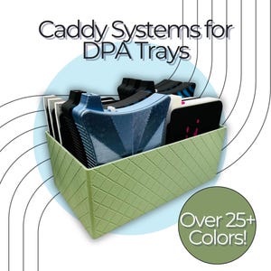May include: A light green, diamond-patterned caddy containing various DPA trays in black, white, and blue. The text "Caddy Systems for DPA Trays" is at the top, and a green circle with "Over 25+ Colors!" is at the bottom.
