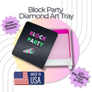 May include: A white diamond art tray with a black lid featuring the text Block Party and a party popper graphic. The lid is partially open, revealing a white tray with pink grooved channels. Includes text Color Blockers Dream and 2.5x Big Flipping Trays in One, plus a Made in USA flag icon.