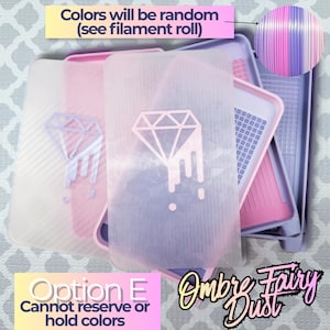 May include: A set of rectangular trays with a diamond drip graphic on the translucent covers. The trays feature a grid pattern on the base and are colored in shades of pink and purple. Text on the image states: Colors will be random (see filament roll), Option E, and Ombre Fairy Dust. Cannot reserve or hold colors.