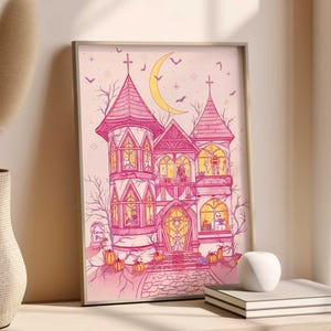 Printable wall art that features my original illustration of a pink haunted house on a pinky-beige background. Inside are ghosts dancing/reading, pumpkin-head skeleton enjoying a pumpkin latte, witches practicing and studying magic.