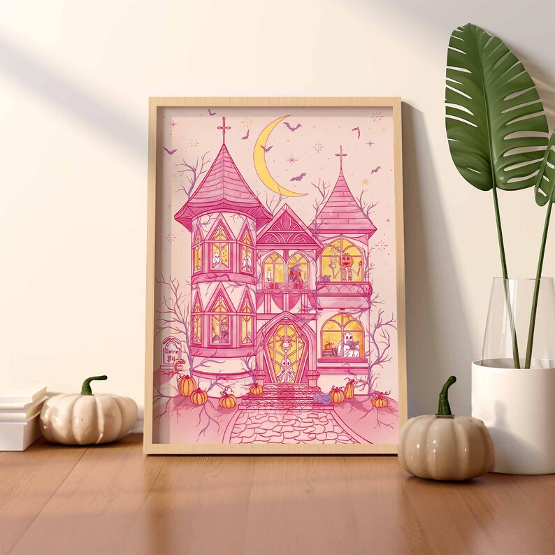 Unframed matte print that features my original illustration of a pink haunted house on a pinky-beige background. Inside are ghosts dancing/reading, pumpkin-head skeleton enjoying a pumpkin latte, witches practicing and studying magic.