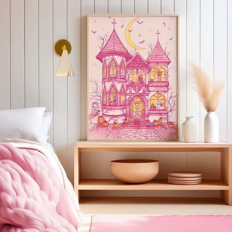 Unframed matte print that features my original illustration of a pink haunted house on a pinky-beige background. Inside are ghosts dancing/reading, pumpkin-head skeleton enjoying a pumpkin latte, witches practicing and studying magic.