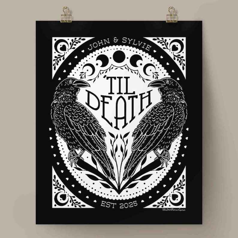 Unframed matte print that features 2 ravens in the shape of a heart & the words, “til death” in the center. Moon phases, botanical illustrations and hearts surround the ravens. The couple’s first names and anniversary date are arched on top and bot
