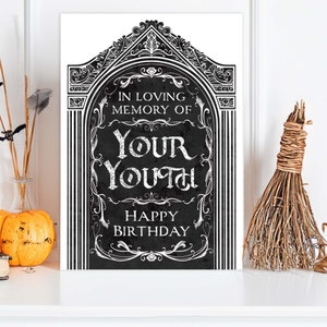 Printable bday card that is 5x7” and vertical. Features an illustrated black gravestone with ornate borders and the words, “in loving memory of your youth. Happy birthday”