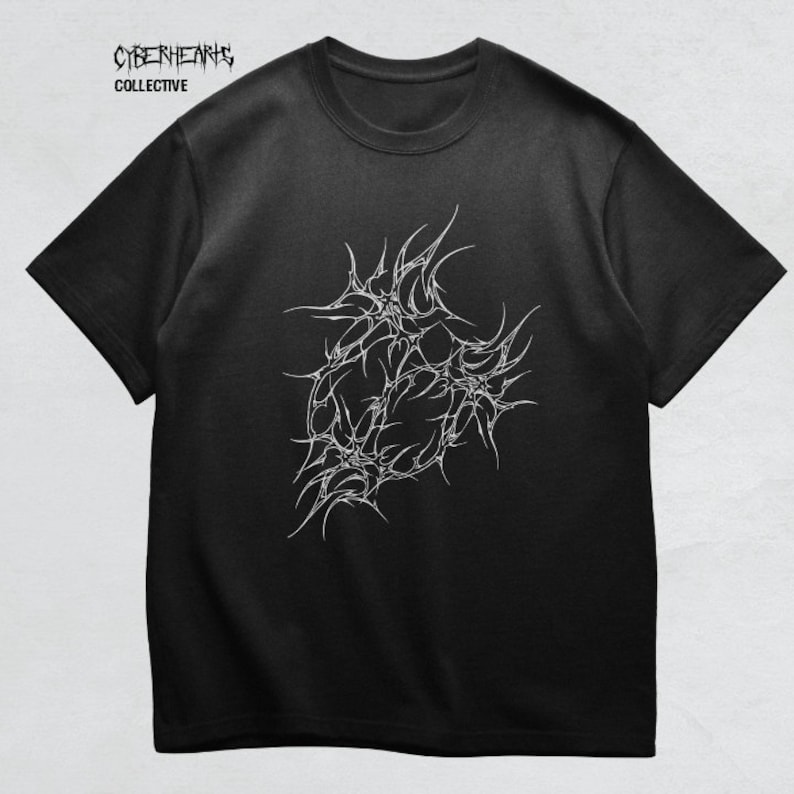 May include: Black t-shirt with a white graphic of a stylized heart design. The text "CYBERHEARTS COLLECTIVE" is printed in white at the top of the shirt.