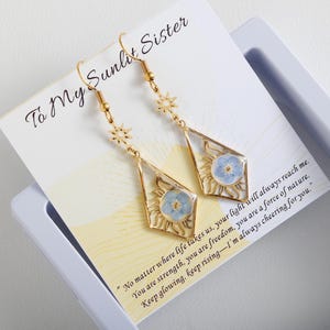 Forget Me Not Sun-totemoorbellen voor zus, oorbellen voor een nieuw begin, aanmoedigingscadeau Verjaardagscadeau voor zus, vrouwelijke empowerment