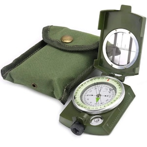 May include: A green compass with a white face and a black needle. The compass has a built-in magnifying glass and a ruler. It comes with a green canvas carrying case.