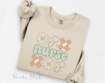 Sudadera de cuello redondo con diseño floral de estetoscopio para enfermeras