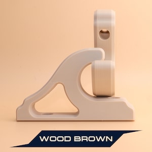 Wood brown horizontal sword wall mount, shown in close-up against a soft background. This sturdy and elegant display bracket securely holds swords, katanas, and collectibles on the wall, combining durability with a clean decorative look.