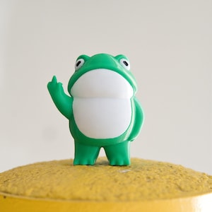 Rebellious Frog Figurine - 3D Printed Cheeky Frog with Middle Finger - Fun Desk Accessory or Unique Gift Idea