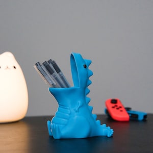 Dino Pencil Pal -3D gedruckter Dinosaurier-Bleistifthalter - Kreativer Schreibtisch-Organizer - Einzigartiges Geschenk für Kinder und Dinosaurier-Liebhaber