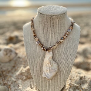 The Opulence II - one of a kind elegant mother of pearl shells