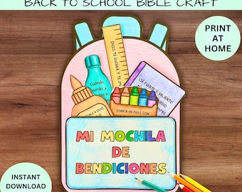 May include: A paper craft backpack with the text "MI MOCHILA DE BENDICIONES" on the front pocket. The backpack contains a ruler, a glue bottle, a box of crayons, and a card with text. The design includes the text "SPANISH BACKPACK BLESSINGS" and "PRINT AT HOME" with 8.5 x 11 dimensions.