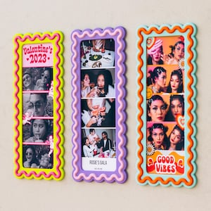 May include: Three vertical rectangular photo frames with wavy, scalloped edges in bright neon colors. The left frame is lime green with pink text reading Valentine's 2023. The center frame is purple. The right frame is light blue with orange accents.
