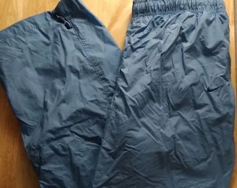 Vintage Nike Cargo Pocket Mesh gevoerde windbroek Joggers