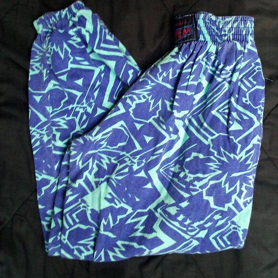 Pantalon survêtement holographique doré et vert années 80 - deguisement