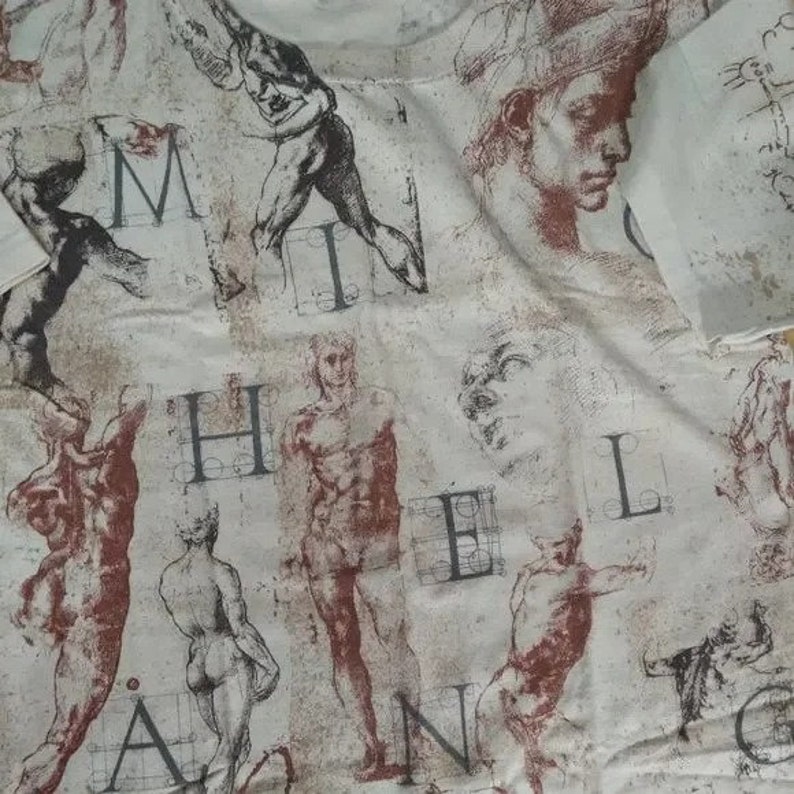 May include: A white fabric with a repeating pattern of sketches of human figures and the words "Michelangelo" in a stylized font.