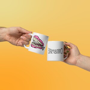 Cartoon Retro Vampire Chattering Teeth Toy Mug | Bambino