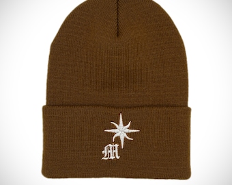 Manifested Worldwide logo Beanie 100% Hypoallergenic Acrylic. Length is approx. 12" Uncuffed