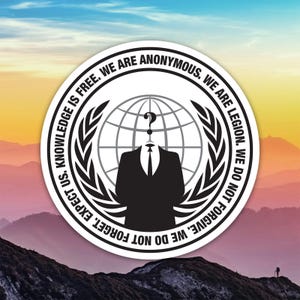 May include: A round sticker featuring the Anonymous symbol: a suit with a question mark for a head, set against a globe. The design is encircled by text that reads, "Knowledge is free. We are anonymous. We are legion. We do not forgive. We do not forget. Expect us."