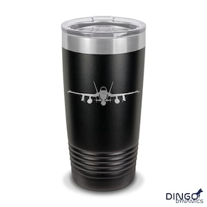 May include: Black stainless steel tumbler with a silver lid and a laser-etched silhouette of a fighter jet.