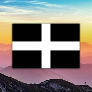 May include: A black and white flag with a white cross on a black background. The flag is set against a backdrop of a mountain range and a colorful sky.
