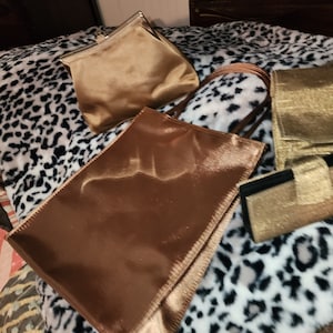 Set of four vintage clutch purses brown&#39;s copper colors