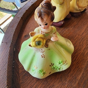 Vintage joseph original ceramic figurine august peridot birthstone