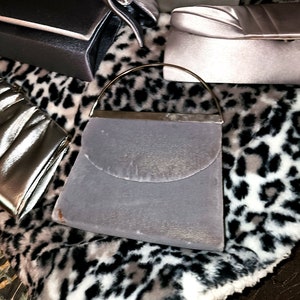 Set of five silver vintage clutch purses