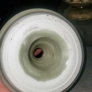 pottery candlestick holder neutral tone