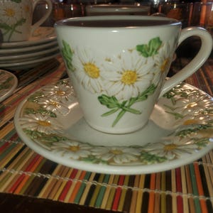 Vintage Metlox Poppytrail Sculptured Daisy - Coffee Cup (4) and Saucers (7) great condition