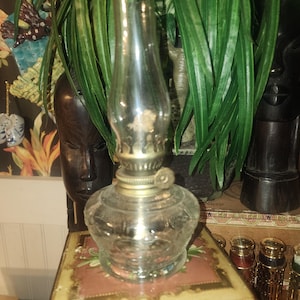 Vintage oil lamp minature with top globe and pattern glass.botton with wick