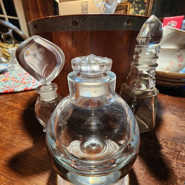 Set of three beautiful glass perfume bottles vintage