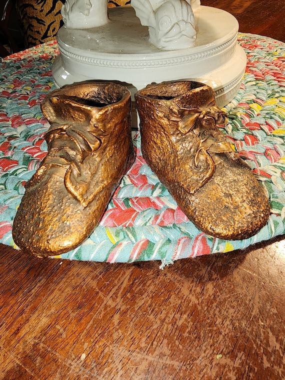Antique bronzed baby shoes a pair