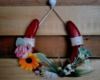 Horseshoe, flowers and honeybee